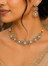 Peach pink beaded necklace set with teardrop pendant and matching drop earrings