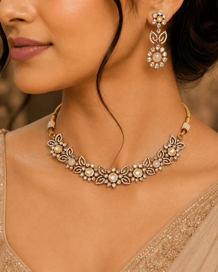 Peach pink beaded necklace set with teardrop pendant and matching drop earrings