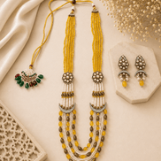 Gold layered beaded necklace set with green-red drops and matching stud earrings