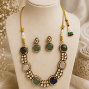Gold-tone multicolor gemstone necklace with round cabochon beads and oval stud earrings