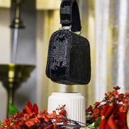 Black crystal mini bag with top handle and faceted beaded texture