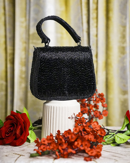 Black crystal mini bag with top handle and rounded beaded body
