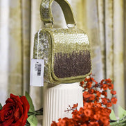 Gold crystal mini bag with top handle and dark gradient beaded panel
