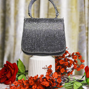 Charcoal beaded crystal mini bag with top handle and structured shape