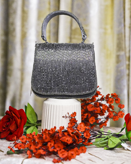 Charcoal beaded crystal mini bag with top handle and structured shape