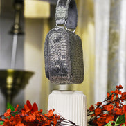 Silver crystal mini bag with top handle and vertical beaded pattern