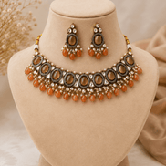 Amber-tone choker necklace set with matching drop earrings, dark oval beads and orange drops