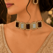 Square enamel statement choker with gold-tone chain and matching stud earrings on model