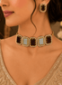 Square enamel statement choker with gold-tone chain and matching stud earrings on model