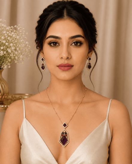 Gold-tone gemstone pendant necklace with matching drop earrings on model