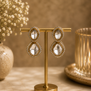 Gold-tone double oval stud earrings, two stacked clear faceted stones with crystal halos