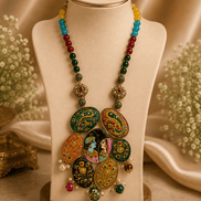 Statement necklace on bust stand with multicolor beads and round hand-painted pendant cluster