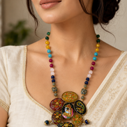 Multicolor beaded statement necklace with circular hand-painted pendants and dangling charms
