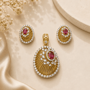 Gold-tone pendant with pink oval halo and matching stud earrings