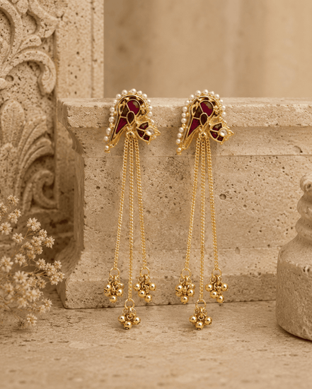 Gold-tone tassel earrings with ruby-pink and teal cabochon studs and long bead fringe chains