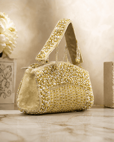 Gold-tone beaded crystal top handle bag with pearl-like bead detailing and chain strap