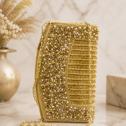 Gold-tone embellished beaded handbag with rounded front, chain strap, and top clasp
