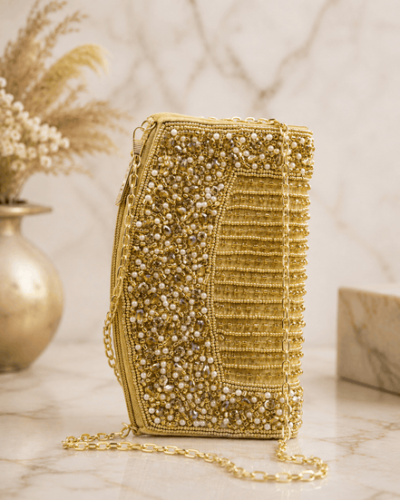 Gold-tone embellished beaded handbag with rounded front, chain strap, and top clasp