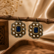 Royal Heritage pearl stud earrings with deep blue square center and decorative pearl halo