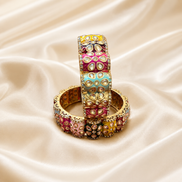 Kundan enamel bangle set, gold with red, green, yellow kundan detailing