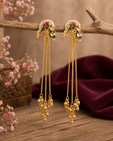 Gold-tone tassel earrings with ruby-pink and teal cabochon tops and long dangling bead chains