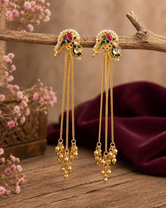 Gold-tone tassel earrings with ruby-pink and teal cabochon tops and long dangling bead chains