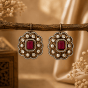 Royal Heritage pearl stud earrings with red square gemstone and decorative pearl border