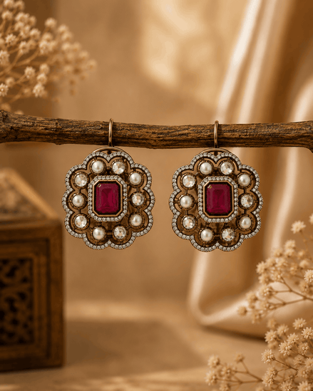 Royal Heritage pearl stud earrings with red square gemstone and decorative pearl border