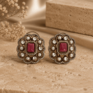 Royal Heritage pearl stud earrings with red square center and ornate gold-tone border