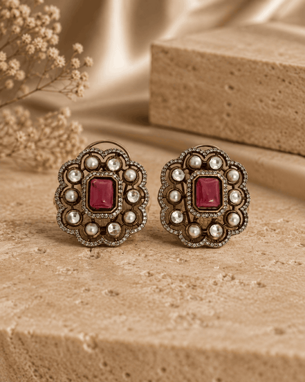 Royal Heritage pearl stud earrings with red square center and ornate gold-tone border