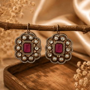 Royal Heritage pearl stud earrings with red square gemstone and round ornate pearl border