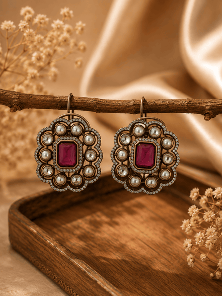 Royal Heritage pearl stud earrings with red square gemstone and round ornate pearl border