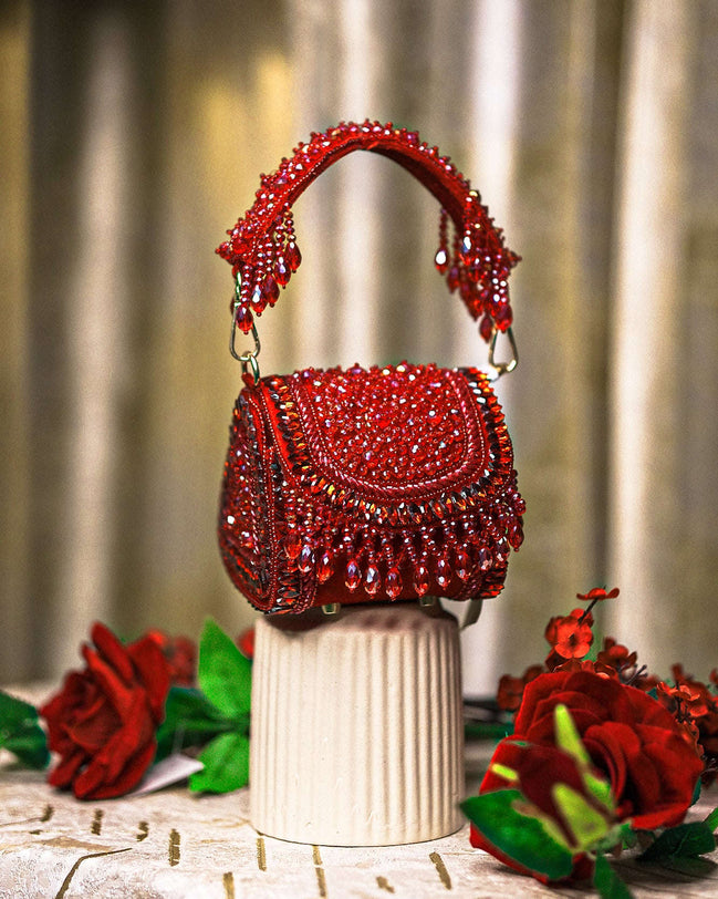 Red crystal mini bag with beaded top handles and fringed front drape