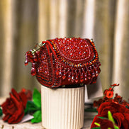Red crystal mini shoulder bag with rounded flap and gold-tone chain handle