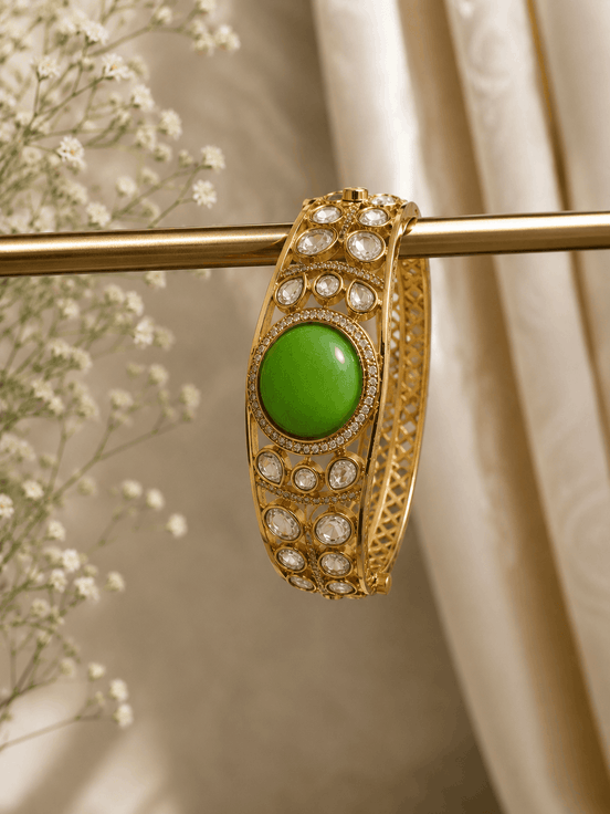 Vintage royal cuff bracelet gold tone with green oval center and bezel crystal stones