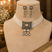 Cream choker necklace with layered beaded rows, square back detail, and triple drop ornaments