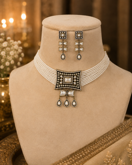 Cream choker necklace with layered beaded rows, square back detail, and triple drop ornaments
