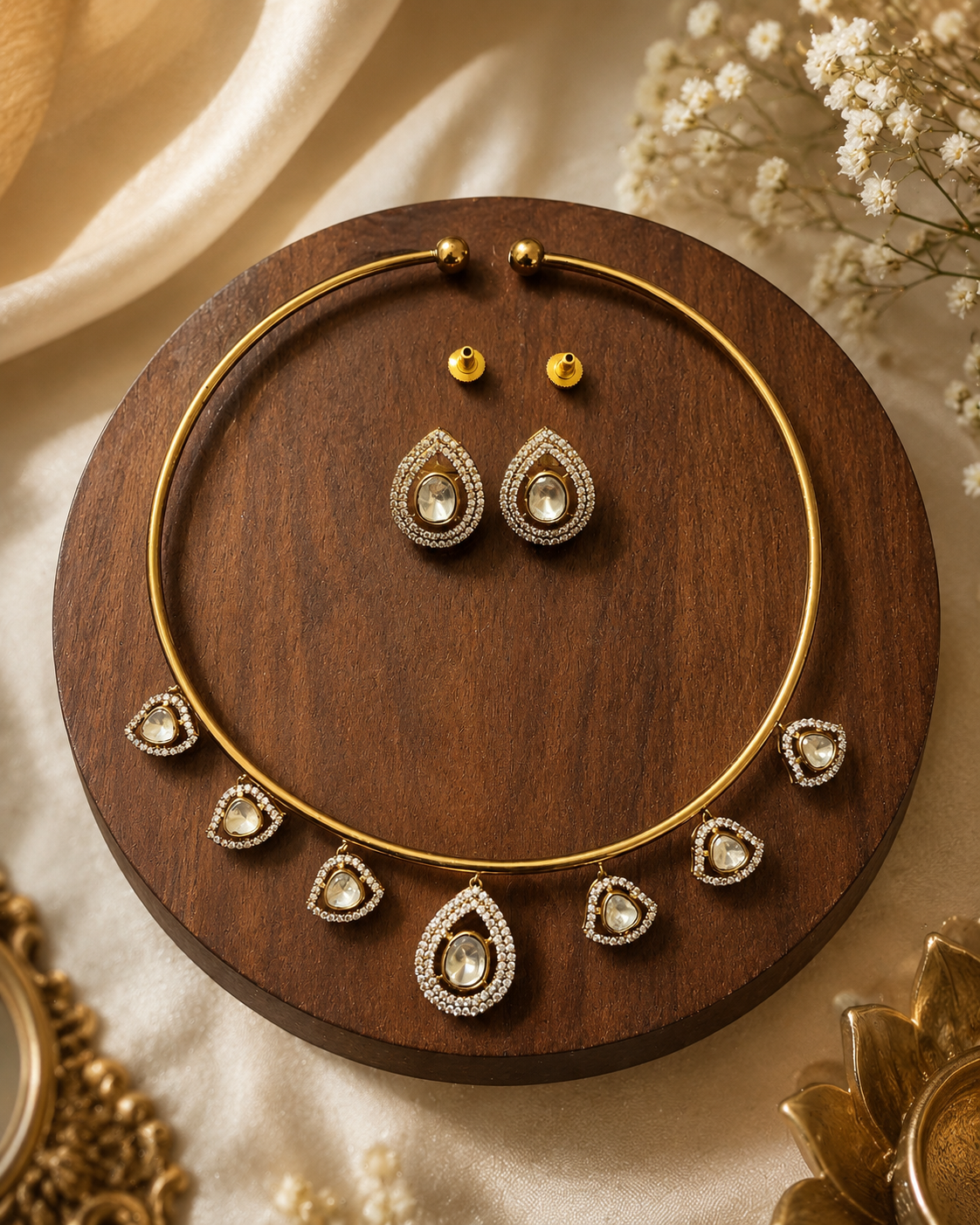 Gold-tone necklace and oval drop earrings set with crystal-like accents